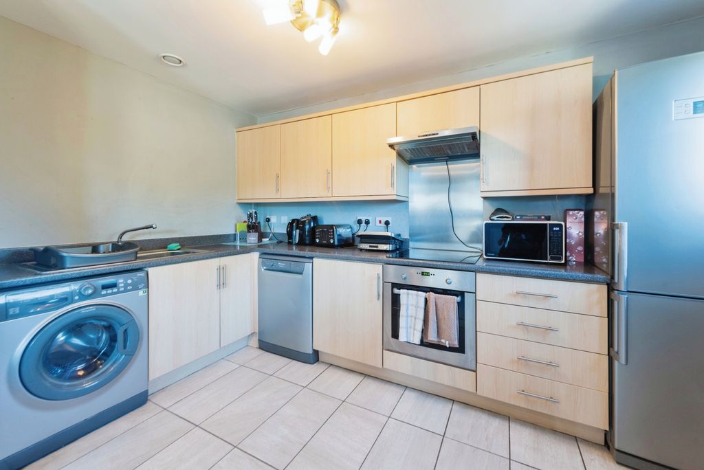 Property photo 3 of 12 Kitchen