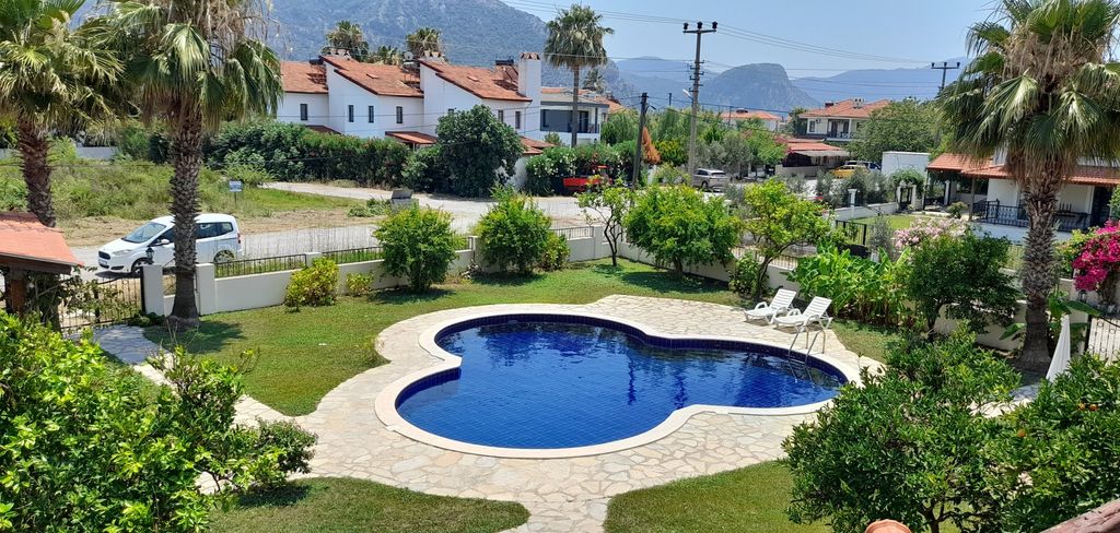 Property photo 2 of 16 Detached Villa With A Shared Pool For Sale In Dalyan - Pretty Mature Gardens And The Communal, Uniquely Shaped Pool