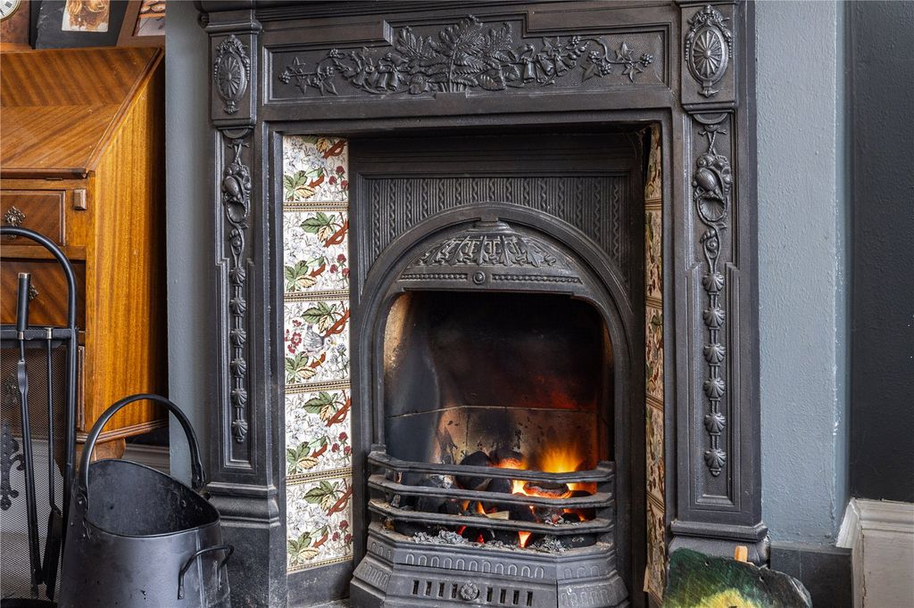 Property photo 2 of 11 Fireplace