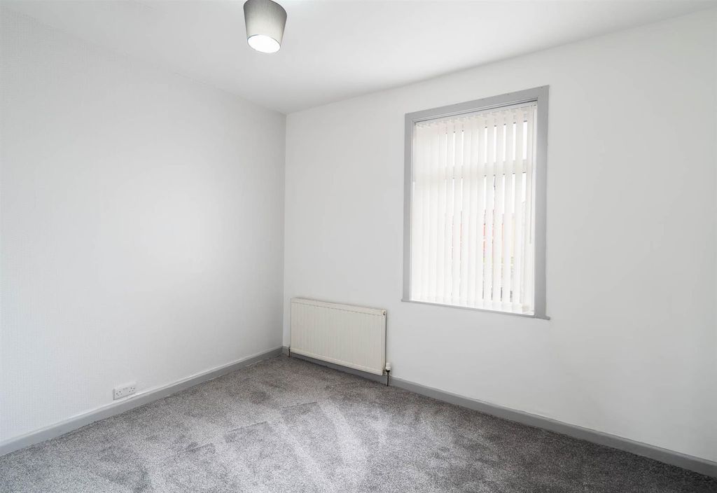 Property photo 3 of 12 Rear Bedroom