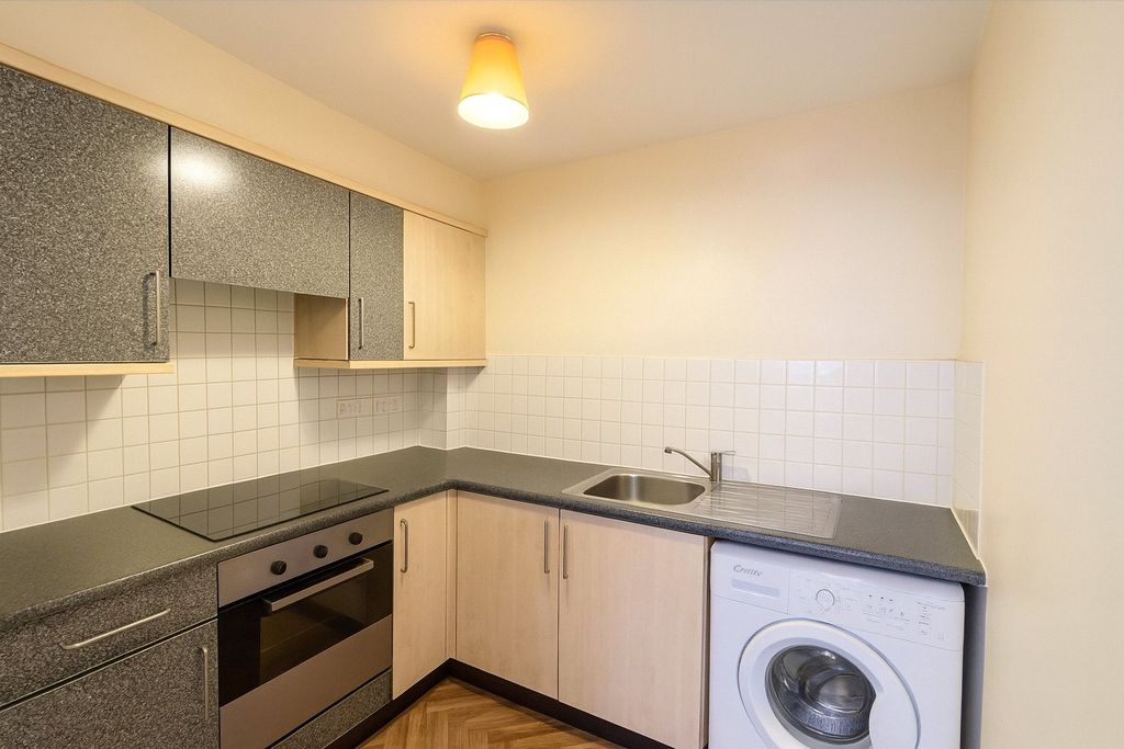 Property photo 3 of 6 Kitchen