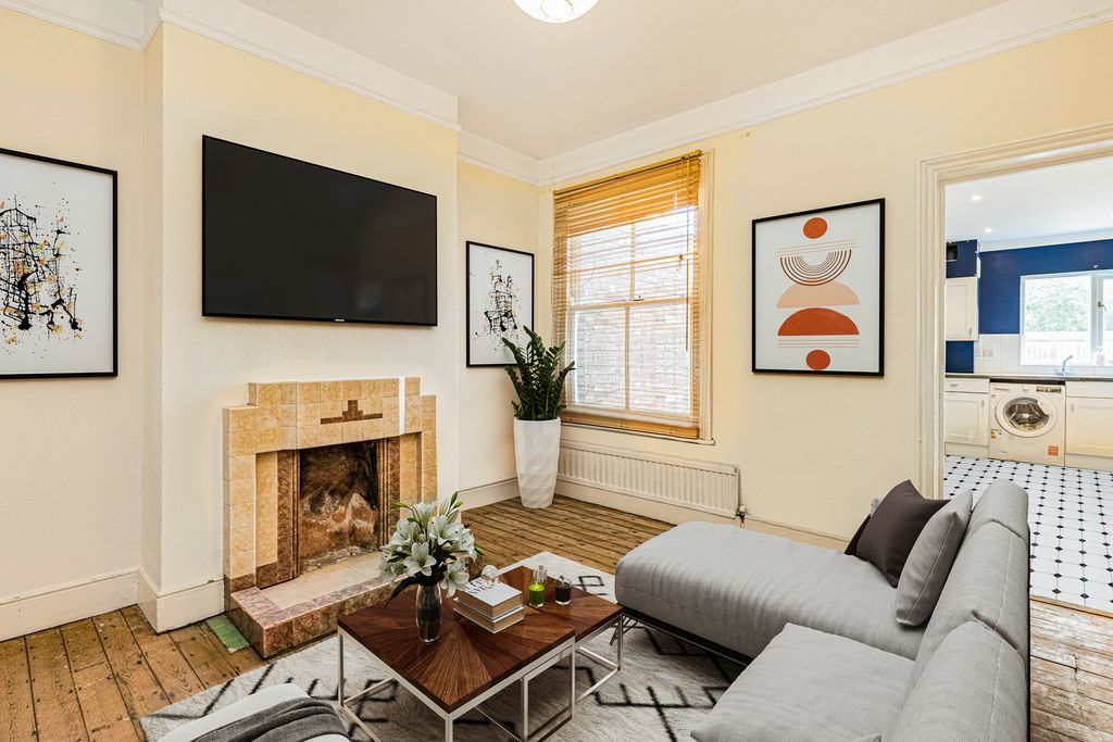 Property photo 3 of 12 Living Area - Angle 2