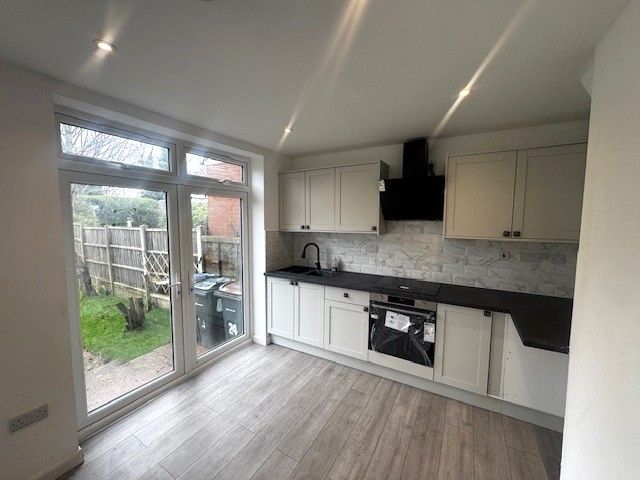 Property photo 3 of 8 Kitchen