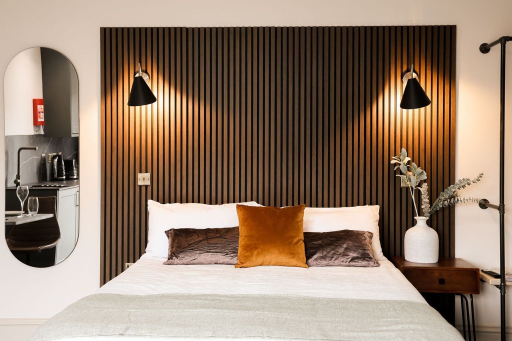 Property photo 2 of 18 Stylish Double Bedroom With Feature Wood Paneling...