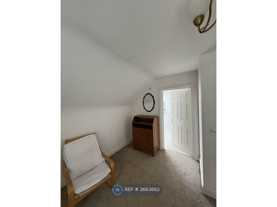 Property photo 2 of 22 Attic Bedroom