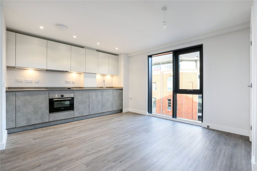 Property photo 2 of 9 Kitchen/Living Area