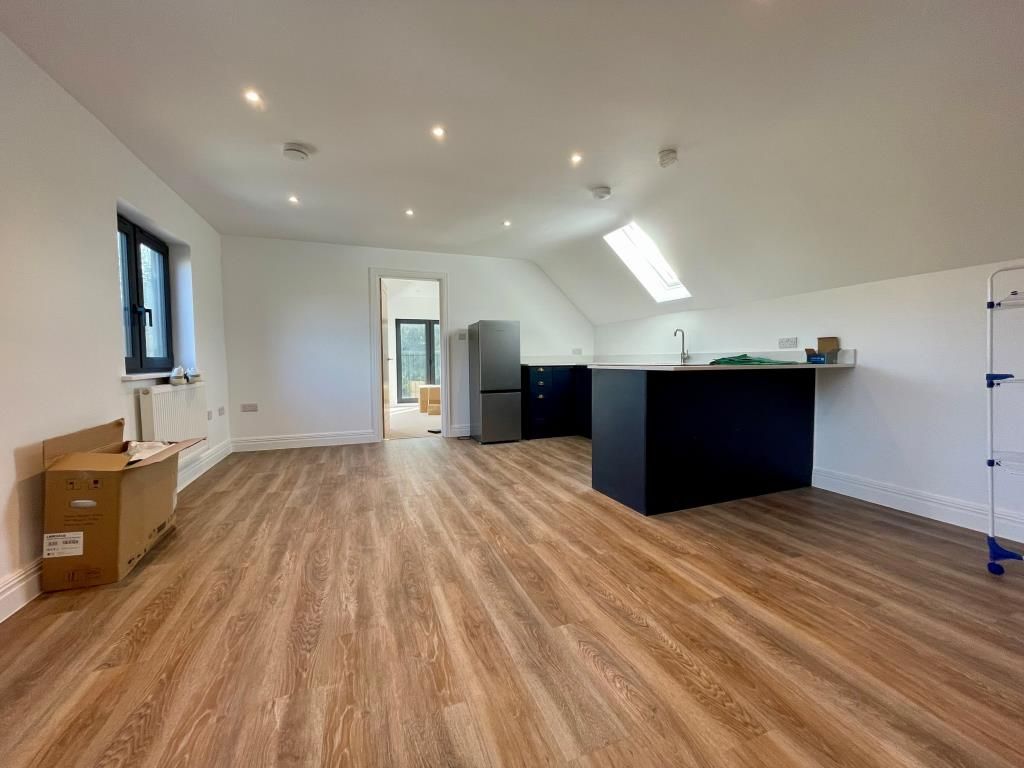 Property photo 1 of 8 Living Area