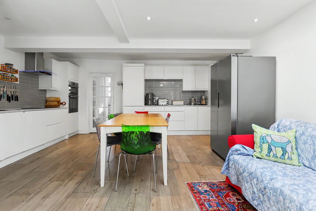 Property photo 3 of 17 Kitchen Dining Space - Angle 3