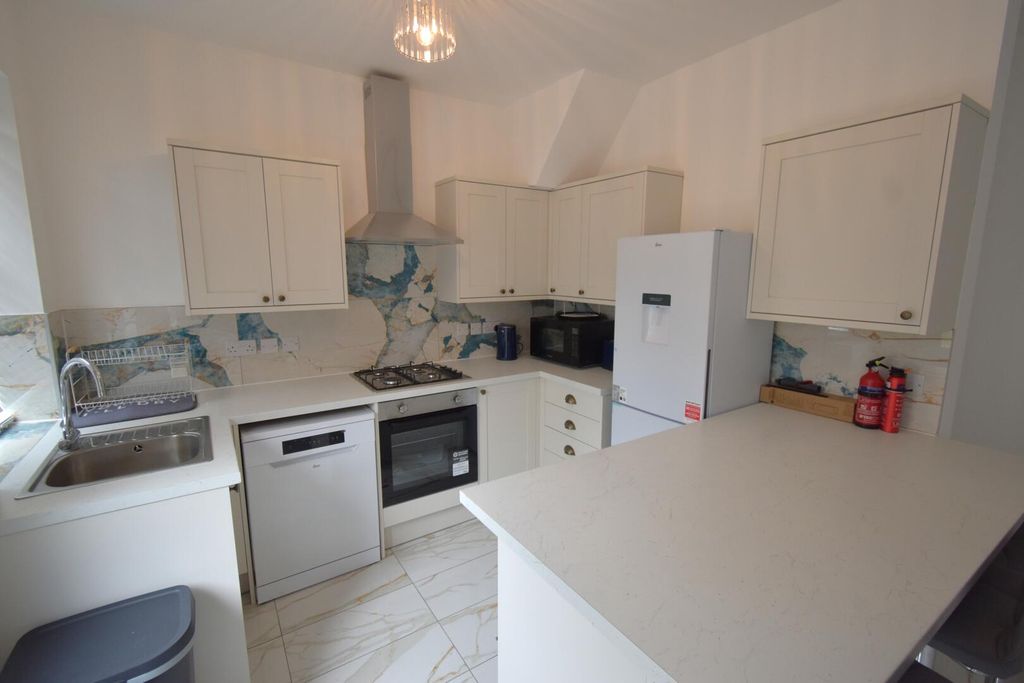 Property photo 3 of 7 Kitchen