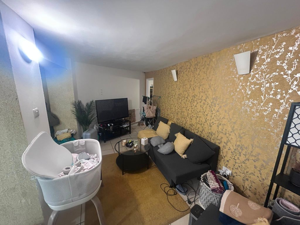 Property photo 1 of 5 Living Area