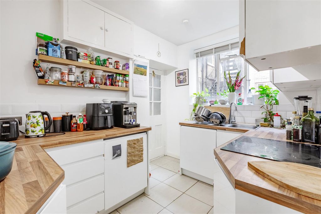 Property photo 3 of 12 Kitchen