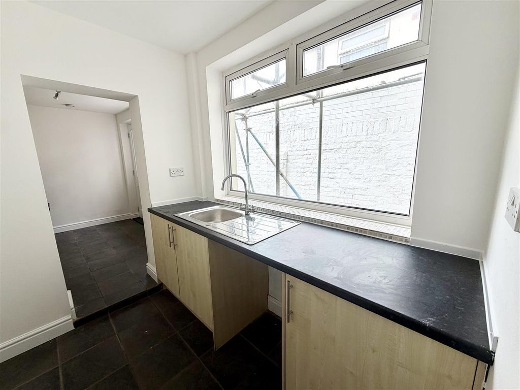 Property photo 3 of 7 Kitchen/Utility