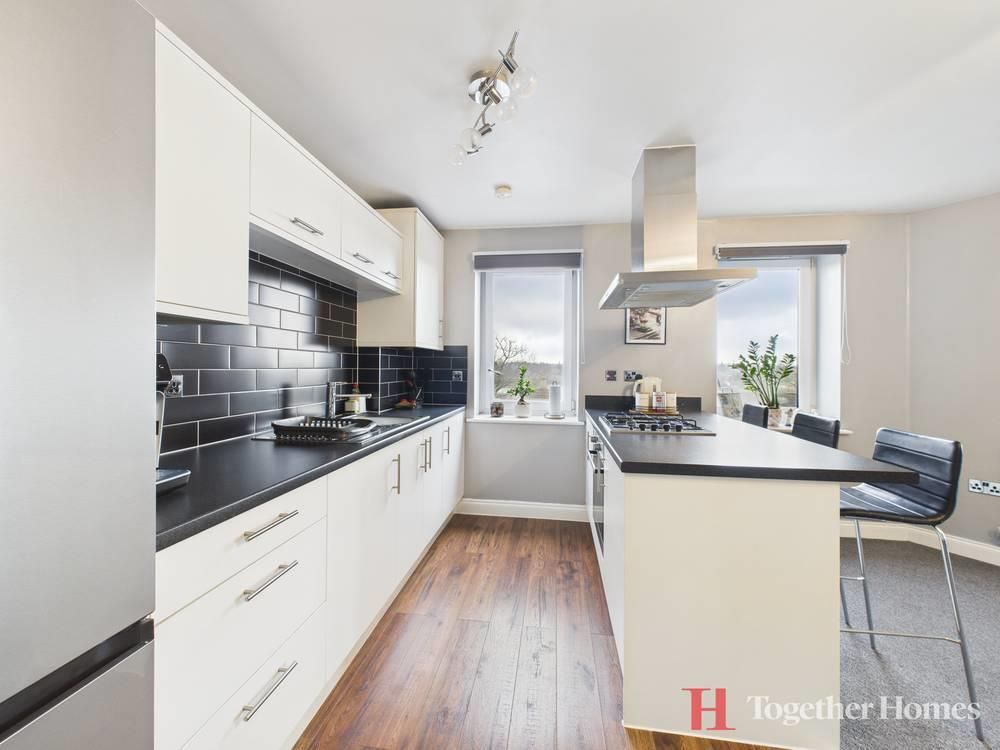 Property photo 3 of 12 Kitchen