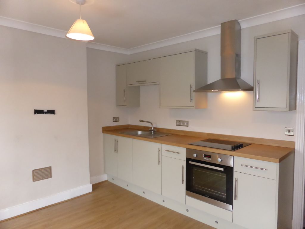 Property photo 1 of 7 Kitchen Area
