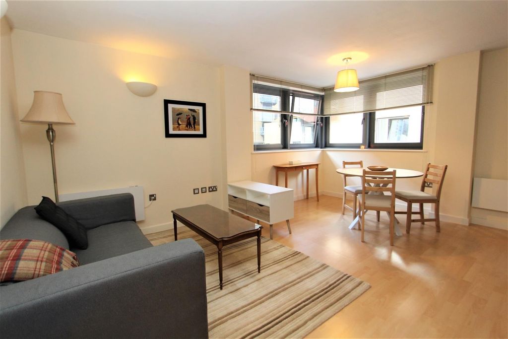 Property photo 1 of 9 Bright Living Area With Dining Set And Sofa...