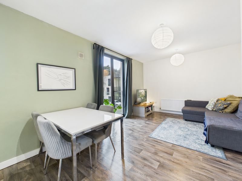 Property photo 3 of 12 Lounge/Dining Area