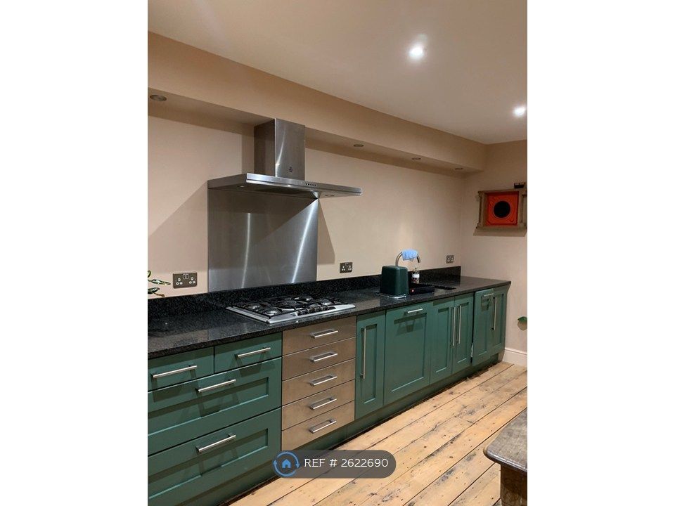 Property photo 2 of 12 Kitchen