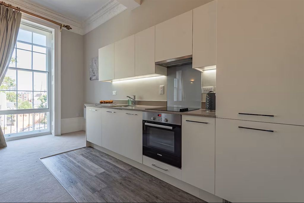 Property photo 3 of 8 Kitchen