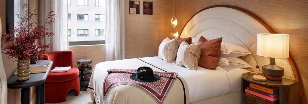 Property photo 3 of 5 Double Bed With Circular Headboard, Bedside Tables, End Table And Seating.