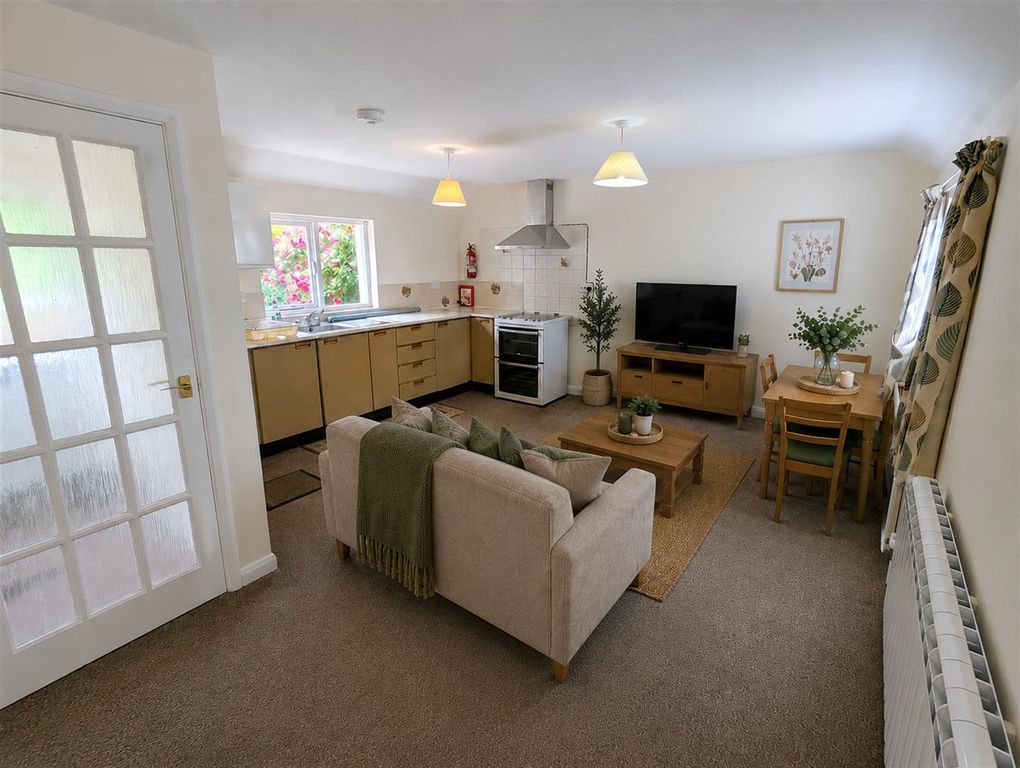 Property photo 3 of 12 Living Area.Png