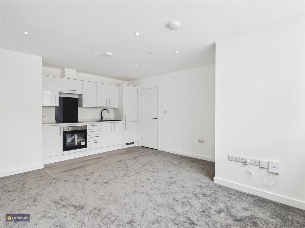 Property photo 1 of 7 Kitchen Living Room