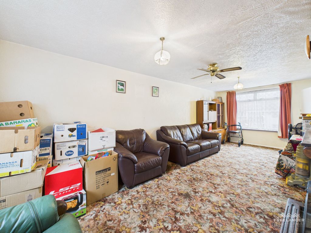 Property photo 3 of 13 Living Room 2