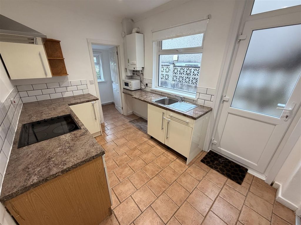 Property photo 2 of 14 Bright Kitchen With Modern Tiling And Tiled Floor...