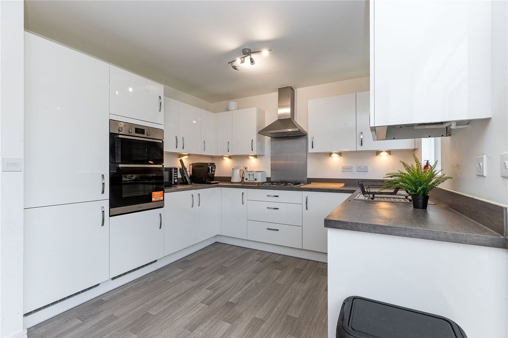 Property photo 2 of 13 Kitchen Area