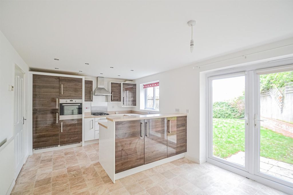 Property photo 2 of 12 Dining Kitchen