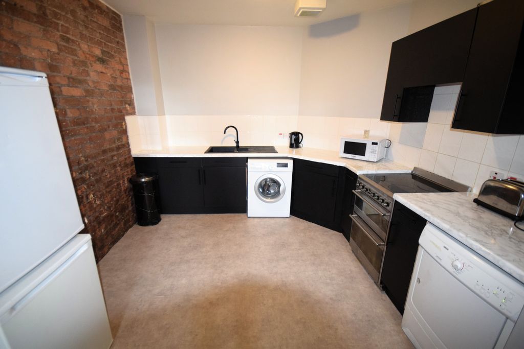 Property photo 2 of 9 Kitchen
