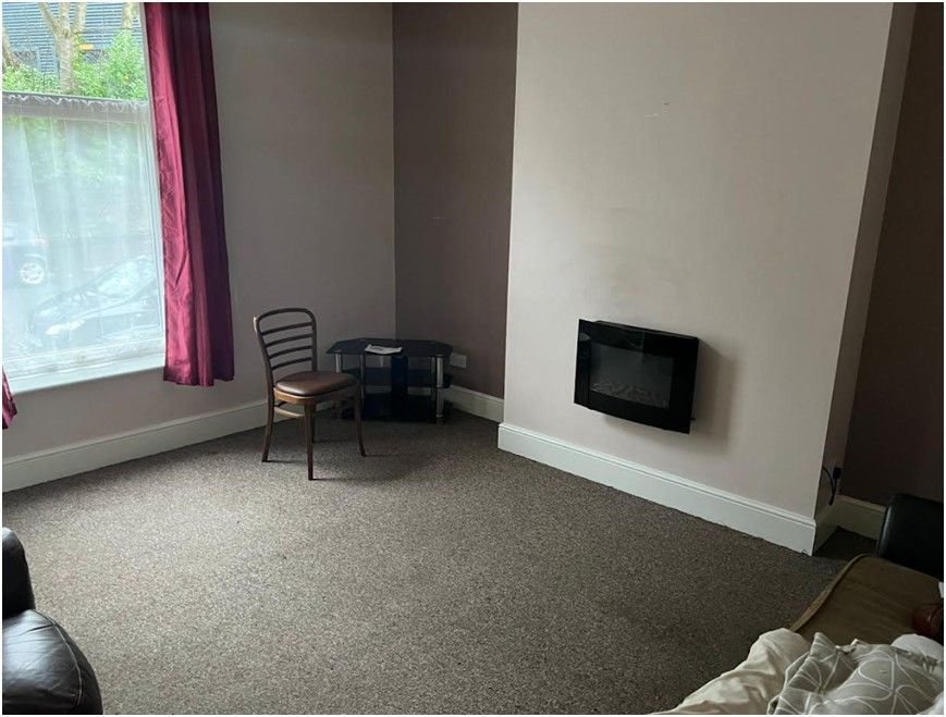 Property photo 3 of 8 Living Room