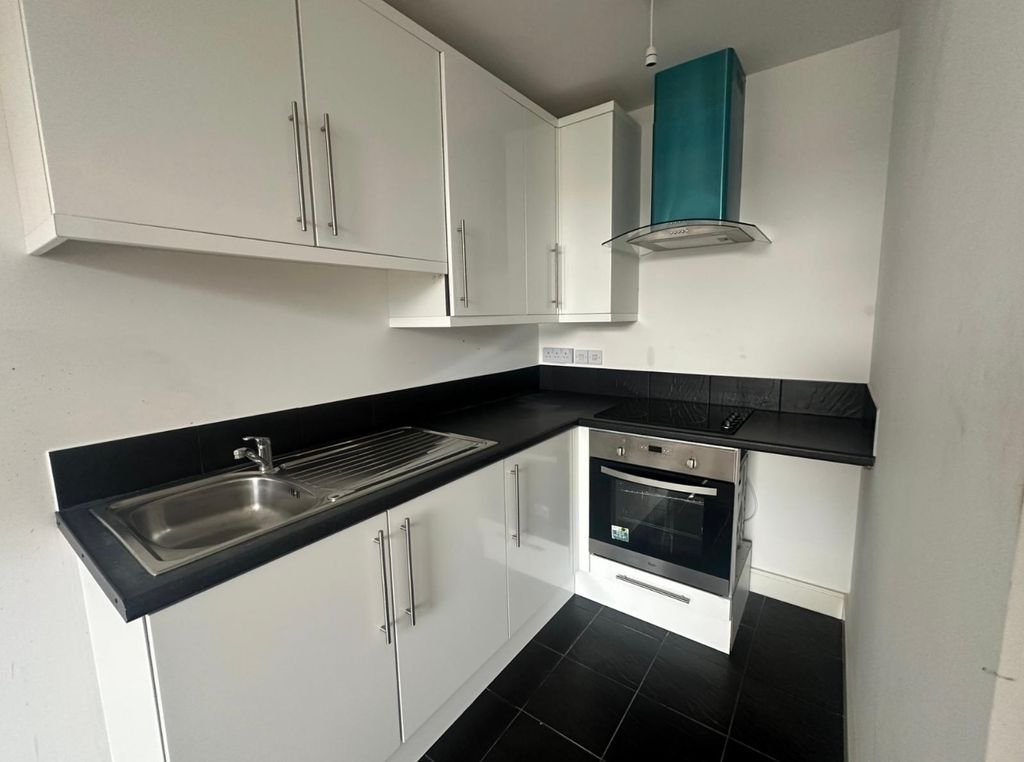 Property photo 3 of 4 Kitchen