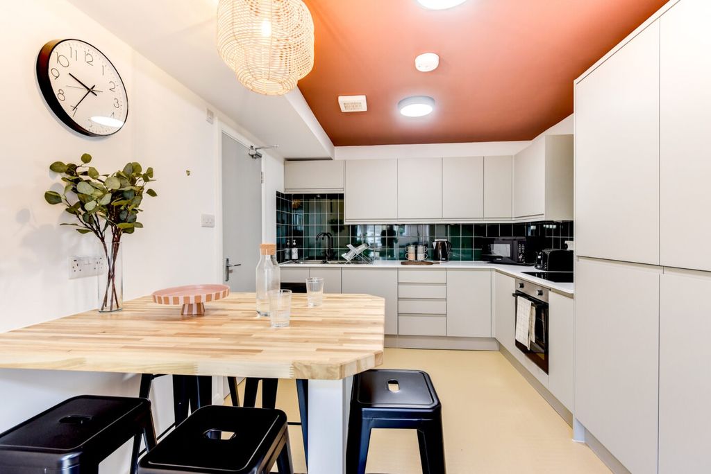 Property photo 2 of 6 Bright Modern Kitchen With A Wooden Breakfast Bar,...