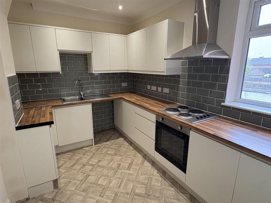 Property photo 1 of 5 Bright Modern Kitchen With Stylish Grey Tiling...