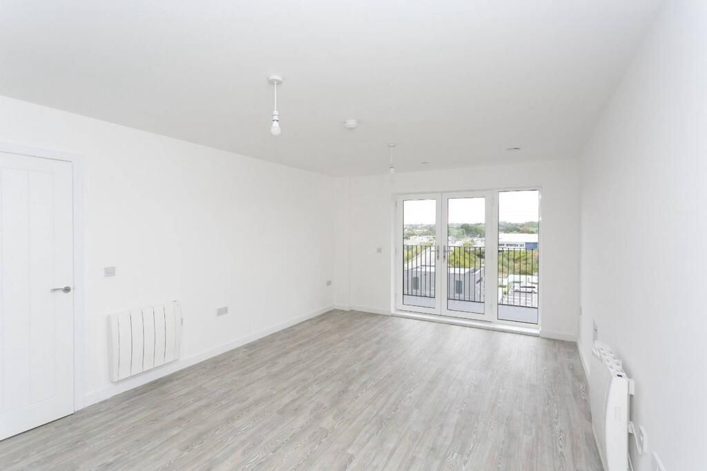 Property photo 1 of 8 Bright, Airy Lounge With Scenic Balcony Doors...