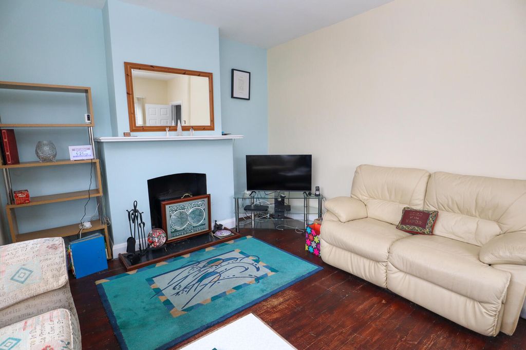 Property photo 3 of 12 Living Room