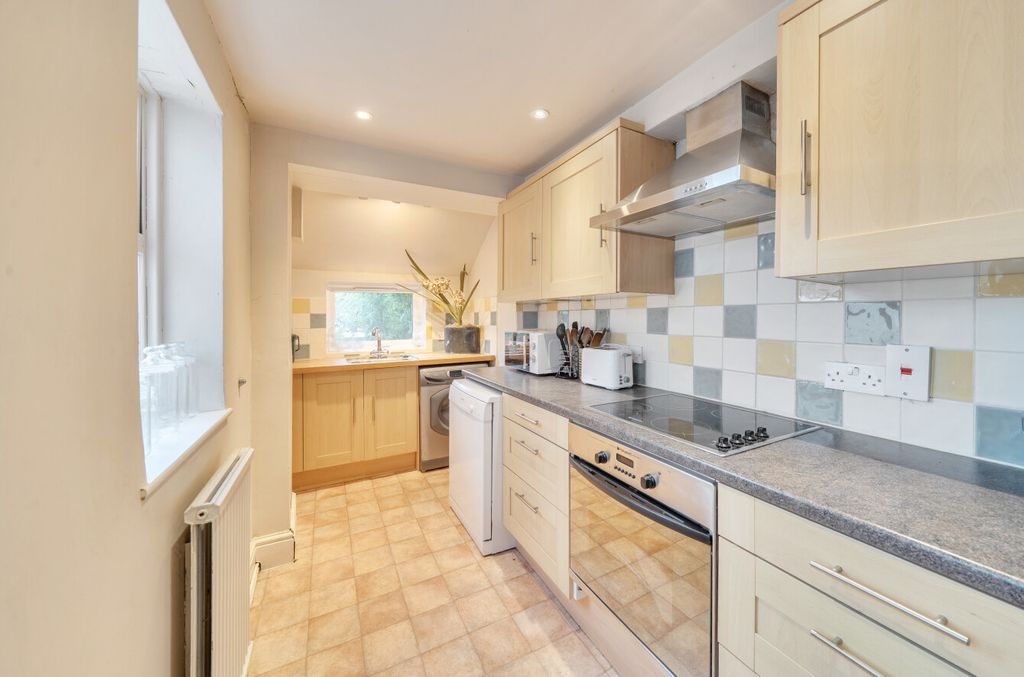 Property photo 3 of 12 Kitchen