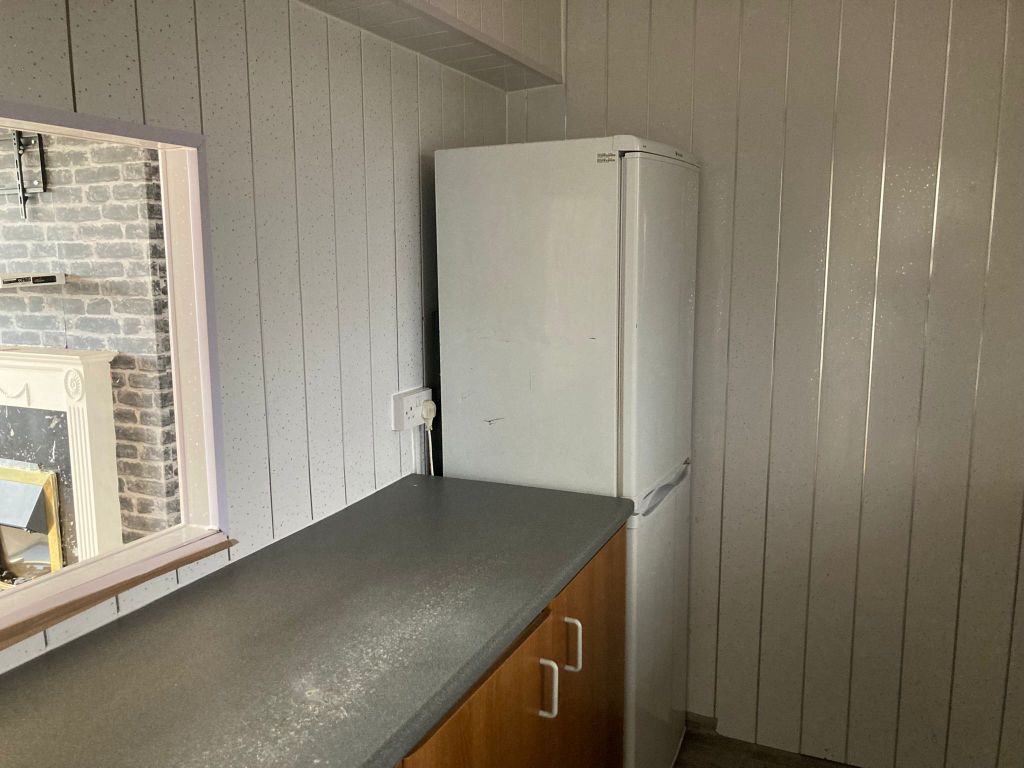 Property photo 3 of 12 Kitchen
