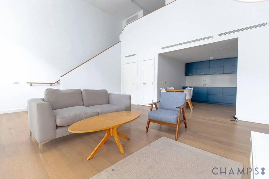 Property photo 1 of 13 Two-Bedroom, Split-Level Apartment In Postmark Development