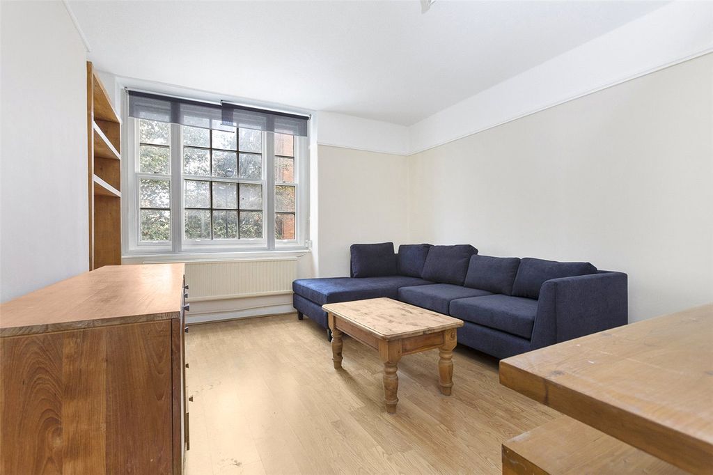 Property photo 1 of 8 Living Area