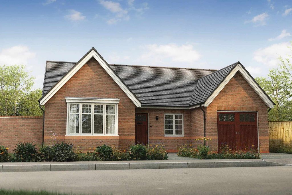 Property photo 1 of 7 A Two-Story Brick House With A Gabled Roof, Surrounded By A Fence And Greenery