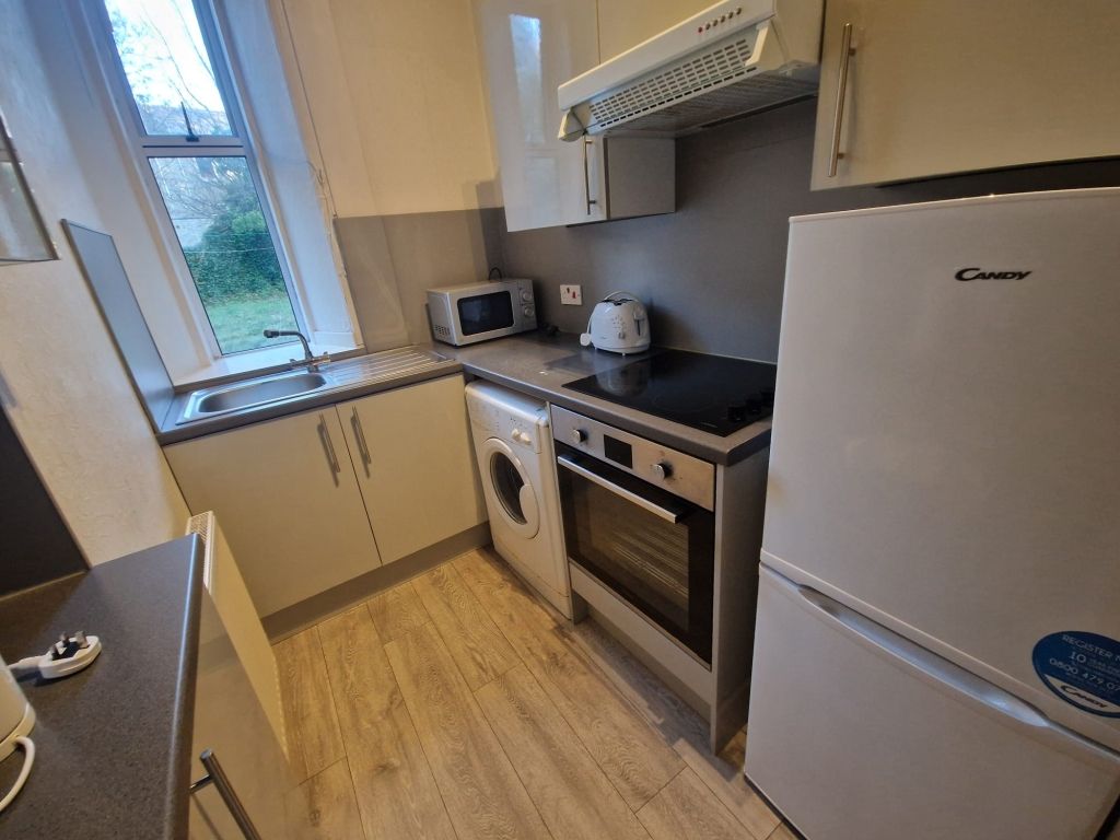 Property photo 2 of 8 Kitchen