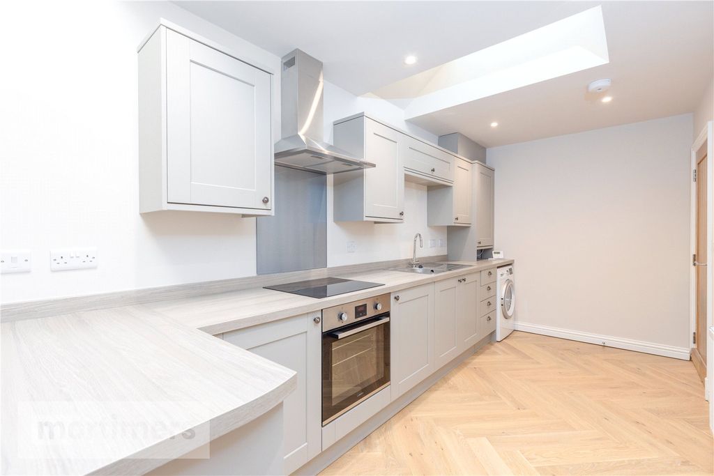 Property photo 3 of 16 Kitchen