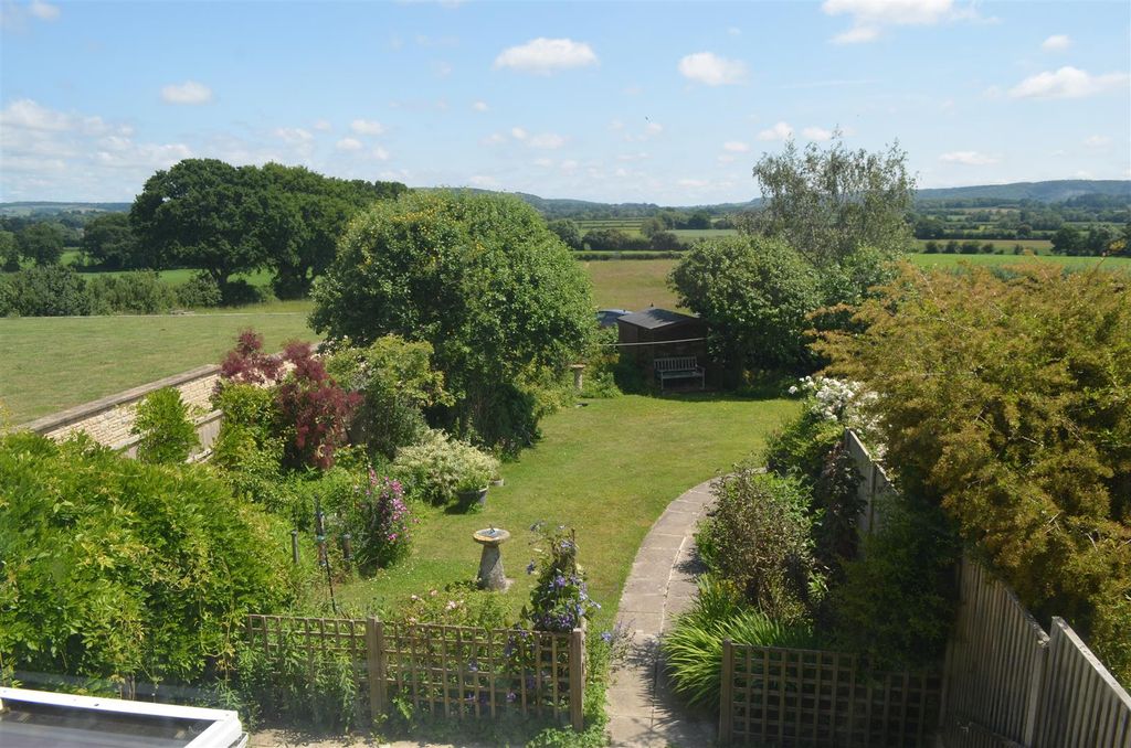 Property photo 2 of 15 Garden And View