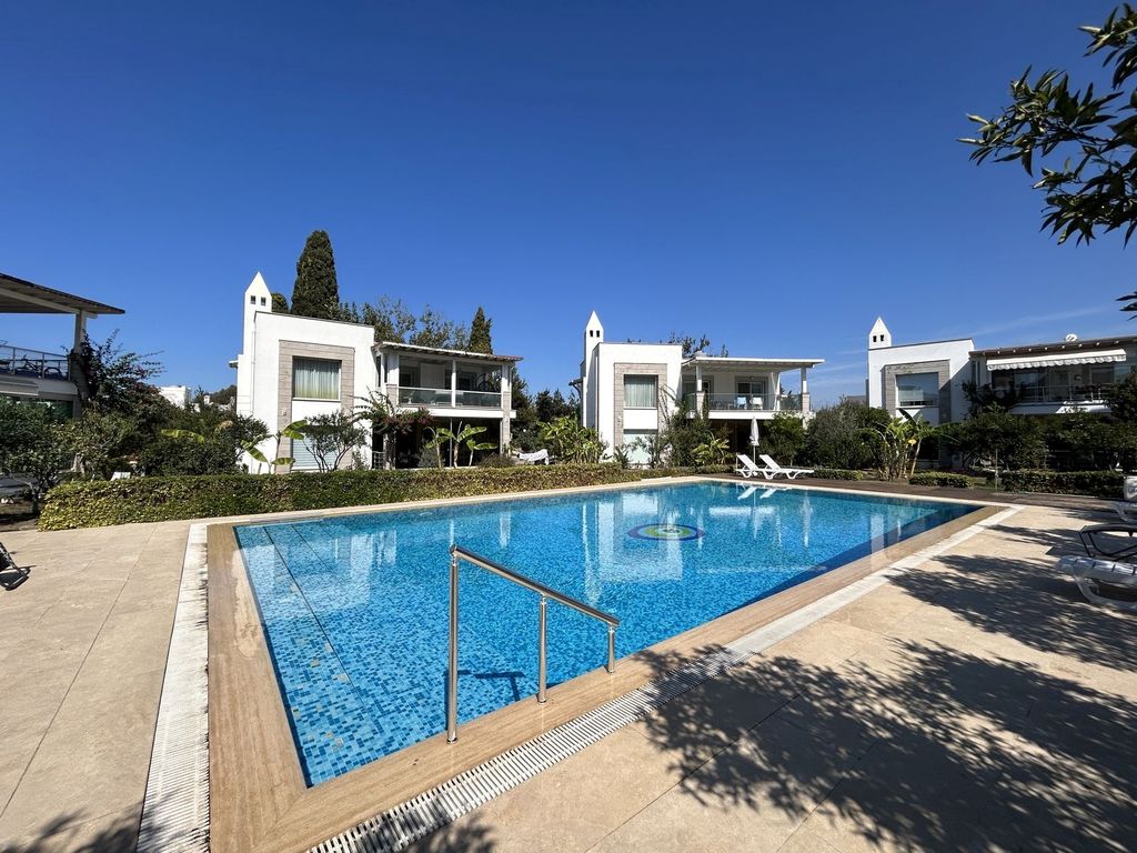 Property photo 1 of 23 A Delightful Apartment In Bodrum For Sale - Communal Pool And Sun Terraces