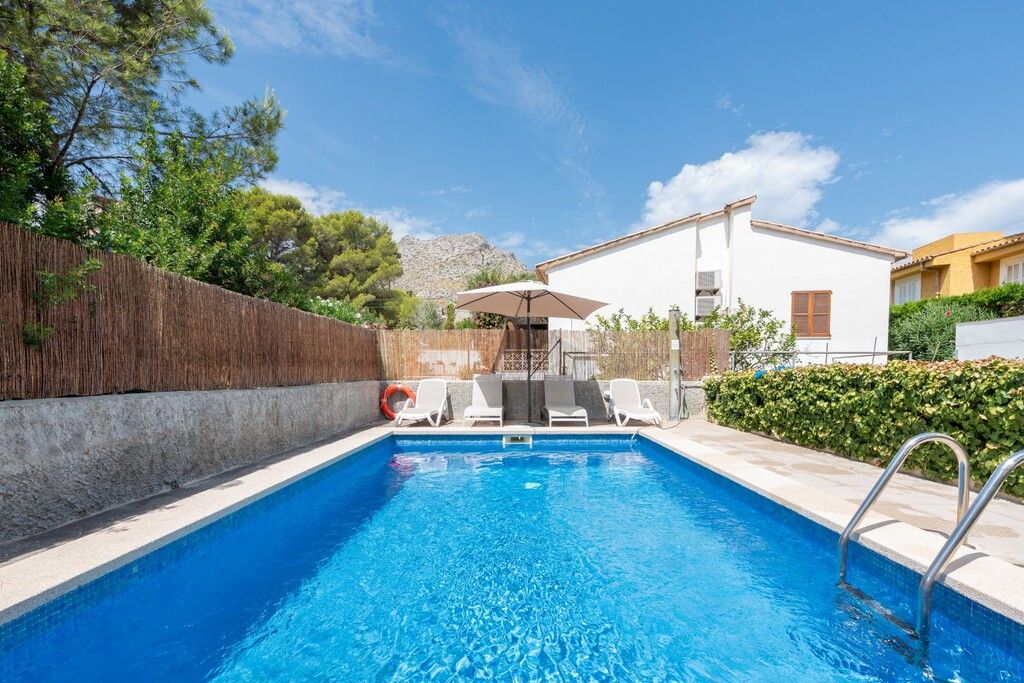 Property photo 2 of 18 Pool And Exterior (1).Jpg