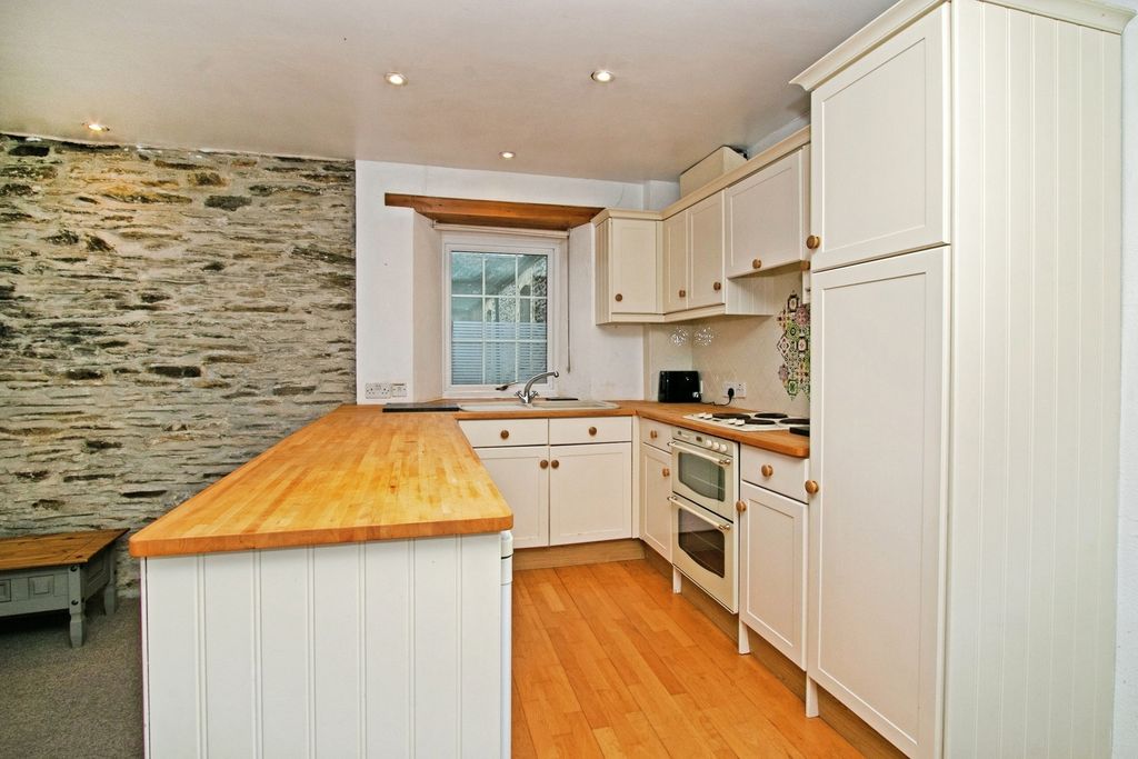 Property photo 2 of 16 Kitchen Area