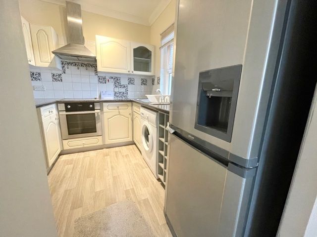 Property photo 2 of 8 Kitchen