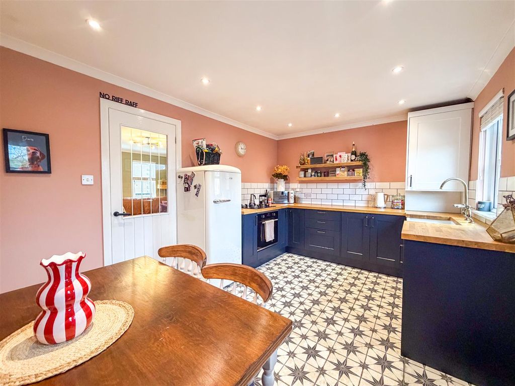 Property photo 2 of 22 Kitchen Dining Area