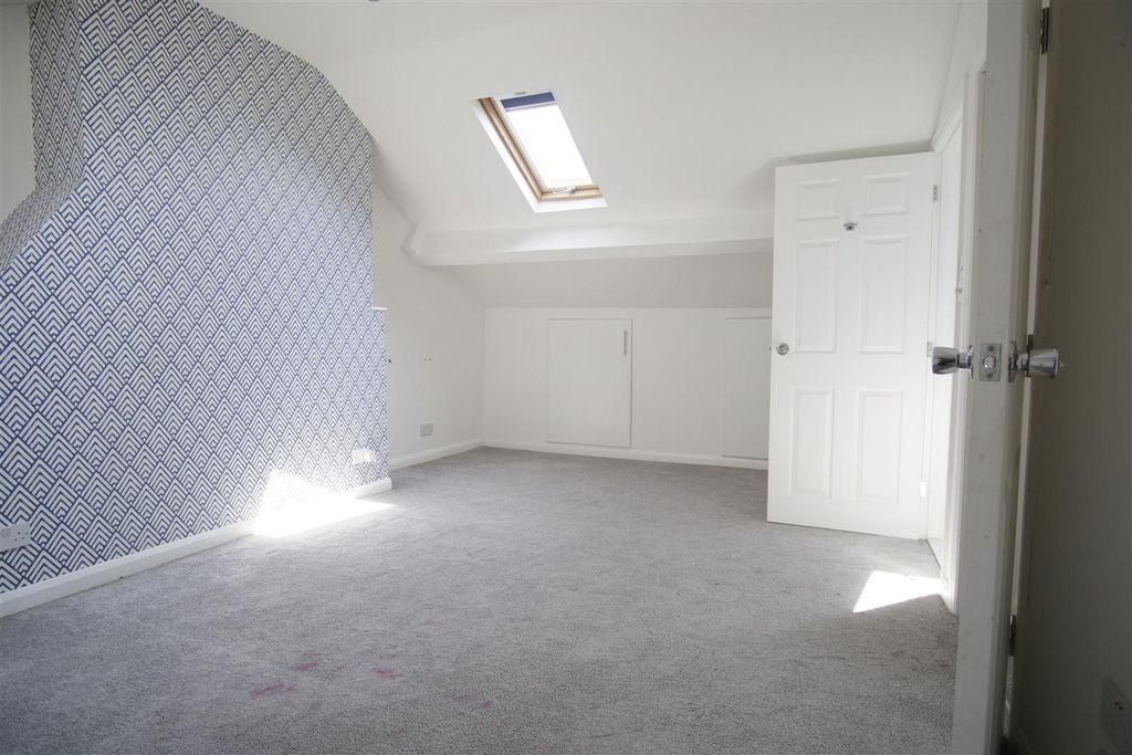 Property photo 1 of 11 Attic Bedroom